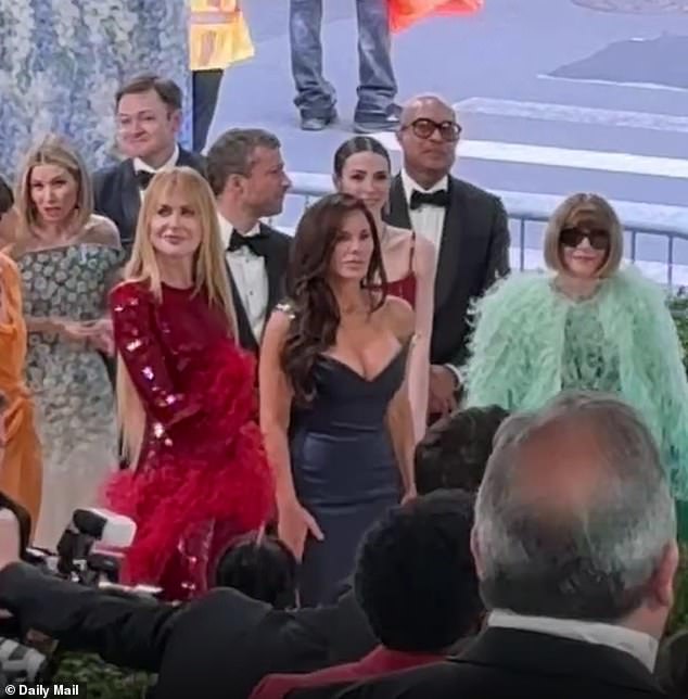 Sanchez, who stood with Nicole Kidman and Anna Wintour, moved her hips back and forth to the music. She held her arms awkwardly against her sides as she shimmied