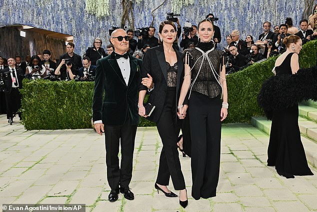 Emily, 43, looked the epitome of style in a semi sheer top with tassels and pearl detailing which was worn with trousers and Jimmy Choo heels