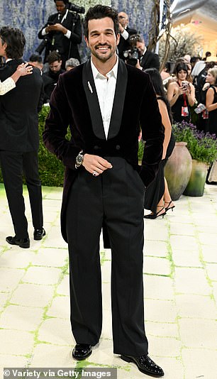 He additionally slipped into a pair of sleek black dress shoes and opted for a watch on his right wrist