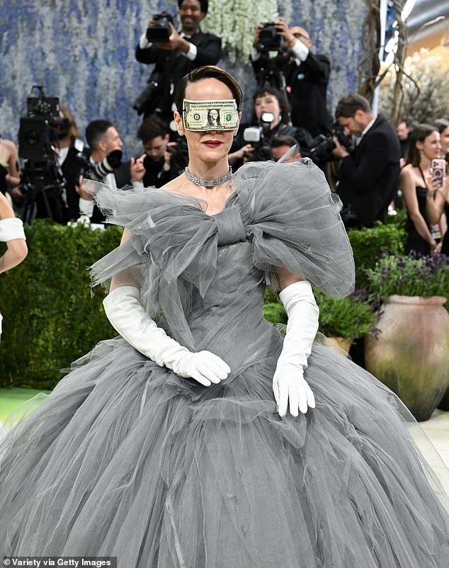 While some called Paulson's money mask 'bold,' many felt it was a tone-deaf move of her to make such a critique at an event that's only accessible to rich elites