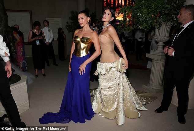 Once she had made it through the gauntlet of the Met Gala red carpet, Jenner caught up with some of her good friends inside the event. She posed with her longtime pal Hailey Bieber, who wore a blue skirt with a golden breastplate
