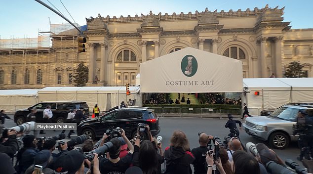 He was wearing a denim jacket, black bandana and sunglasses and his efforts to gatecrash the red carpet fell flat as he was seen being escorted away