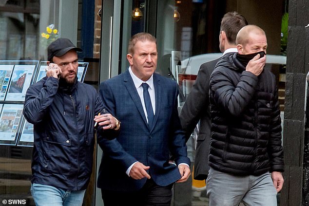 Pictured: Powell (left) with his fellow detectorist Layton Davies (right). Instead of reporting the the ancient valuables when they found them, the duo tried to cash in on their haul by selling the ancient items on the black market