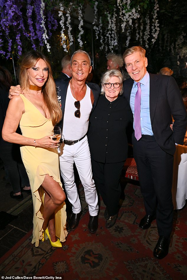 While TV personality Lizzie Cundy put on a daring display in a plunging yellow gown with a thigh-high slit, showing off her cleavage and long legs (seen with Bruno, Brenda and Andrew Pierce)