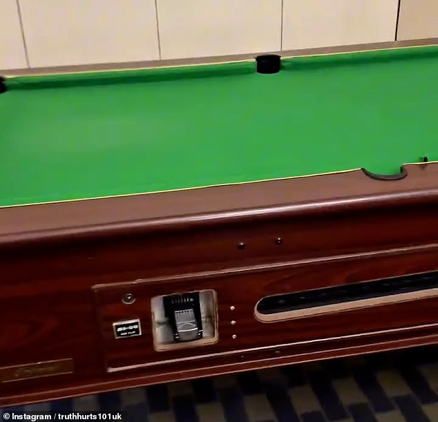 The communal leisure area, which is thought to be being used by around 300 migrants, is also kitted out with a pool table