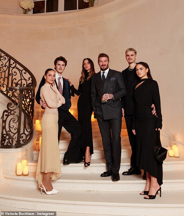 Victoria pictured with David, sons Cruz and Romeo and their girlfriends Jackie Apostel and Kim Turnbull
