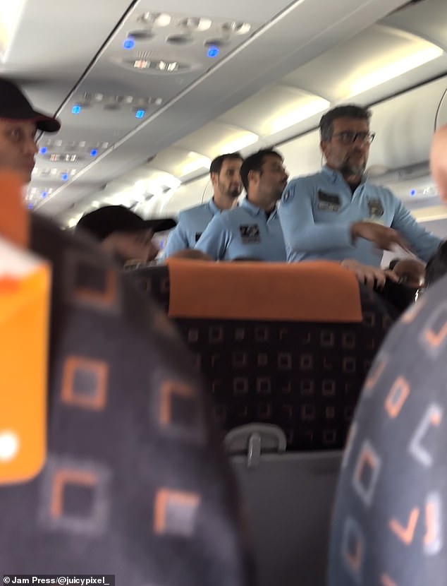 Staff escorted away members of a rowdy British stag party group on an easyJet plane