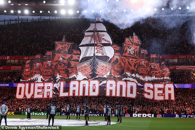 When Arsenal's players came out of the tunnel, the players were met with a wall of sound and a giant tifo with 'over land and sea' written on it – a lyric from a favourite fan song