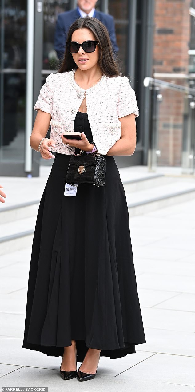 Monochrome magic: Gemma Owen sported a glamorous white and black ensemble for the racing meet