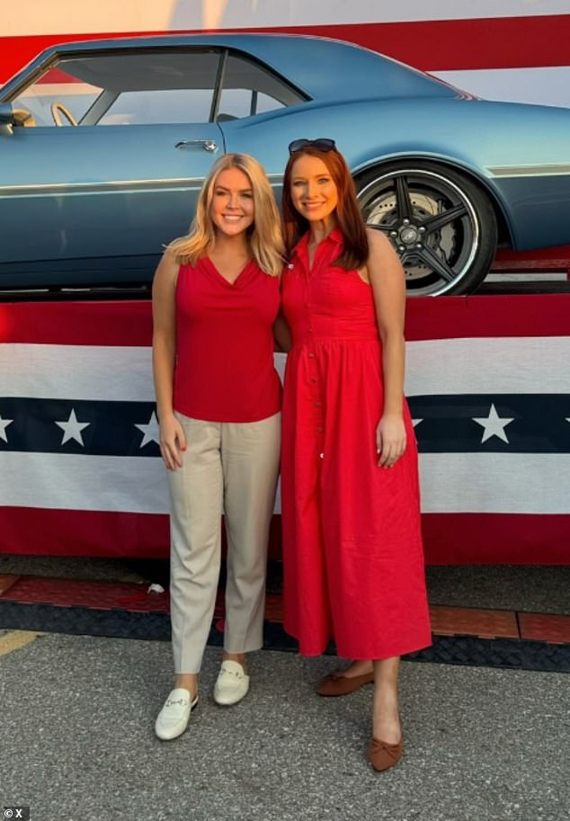 Leavitt and White House deputy press secretary Anna Kelly pose at a Trump event