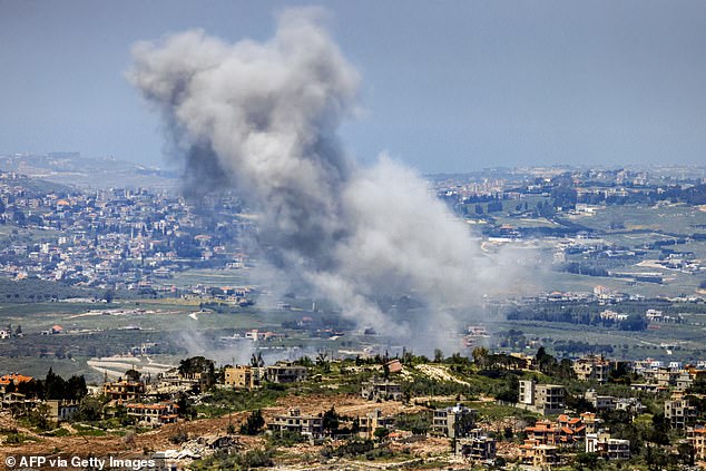 Smoke rises following Israeli bombardment in southern Lebanon as seen from a position across the border in the Upper Galilee in northern Israel on May 7. The Iran war has sparked a separate conflict on Israel's border with Lebanon against the Hezbollah terror group
