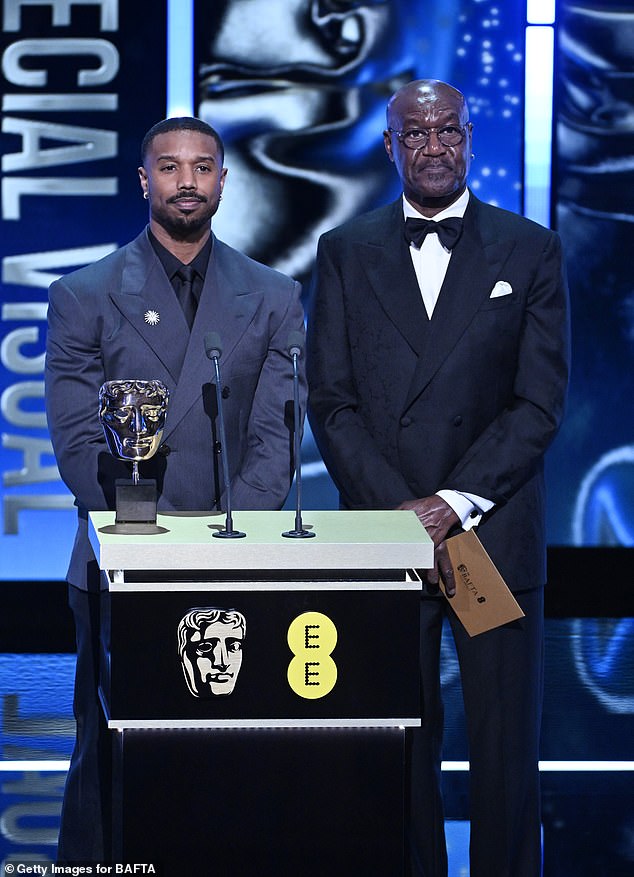 Michael B. Jordan and Delroy Lindo present the Special Visual Effects Award on stage during the EE BAFTA Film Awards 2026 at The Royal Festival Hall on February 22, 2026 in London