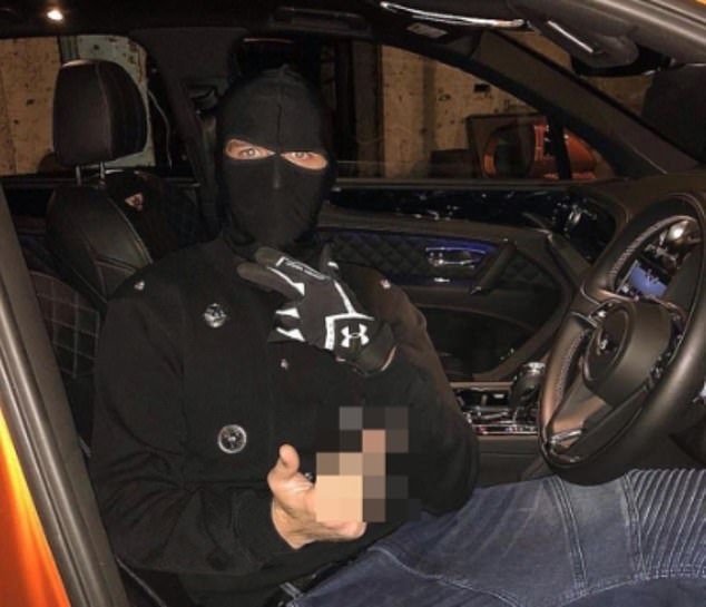 A social media photo of an Albanian gangster holding a gun at the wheel of a car. Our map shows that Balkan gangs have been forced to spread to new parts of the country