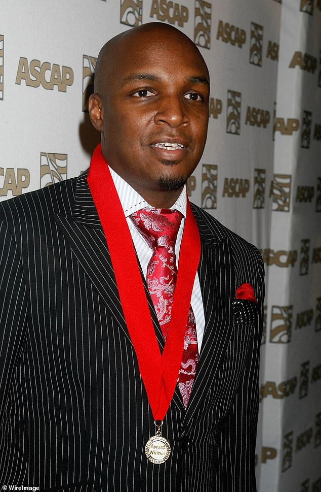 Her first marriage was to music producer Damon Thomas (pictured) from 2000 to 2003