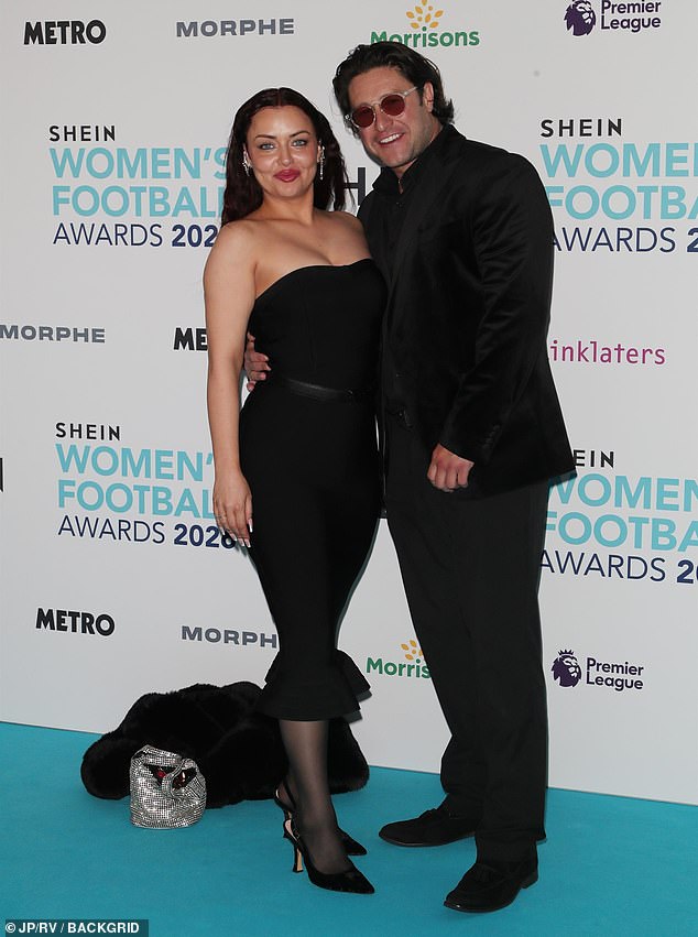 I'm A Celebrity star Shona McGarty wowed in a figure hugging strapless midi dress
