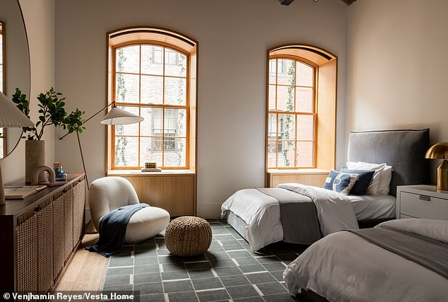 Similar arched windows are in the bedrooms to also allow light to stream inside