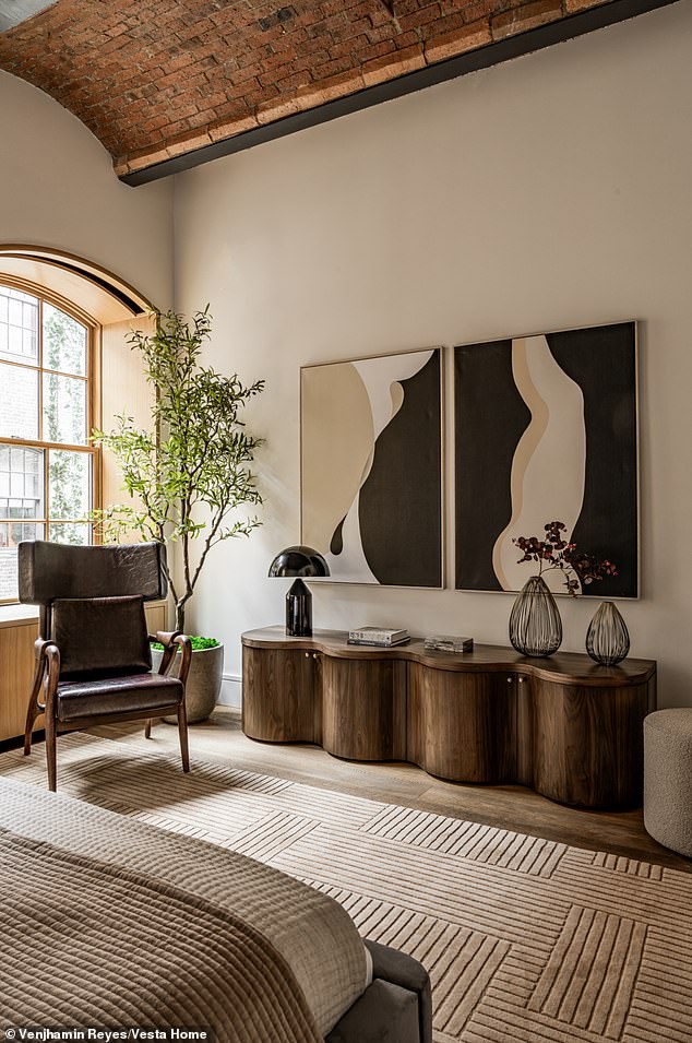 The staging 'was approached with a gallery-like sensibility, keeping the furnishings soft, neutral, and highly edited to showcase the dramatic vaulted ceilings,' per Vesta designer Melinda Wolrab