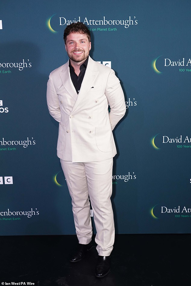 George Clarke wore a white double breasted blazer for the event
