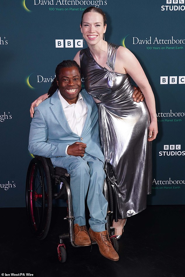 Ade Adepitan smiled for a photo with his wife Linda