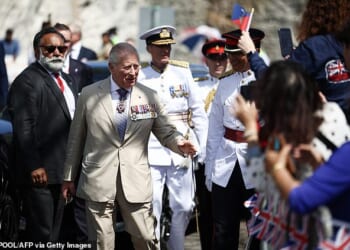 King Charles arrives for a ceremonial welcome at King's Square in St George's, Bermuda, today