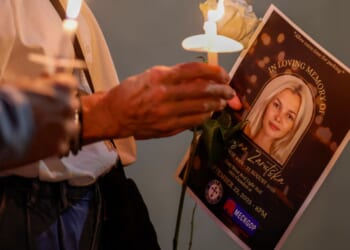 Members of the local community hold a vigil in honor of the late Iryna Zarutska on Sept. 22, 2025, who was stabbed to death on a commuter train by a repeat offender.