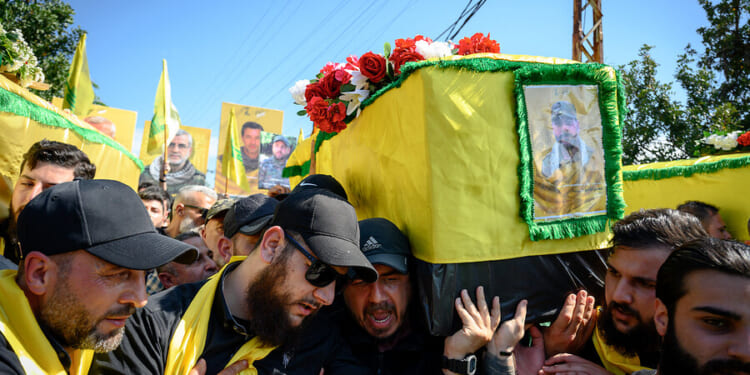 After massive Israeli attacks, how is Hezbollah still fighting?