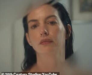 Both films open the exact same way, with a shot of Andy wiping down her bathroom mirror and getting ready to take on the day (pictured in the 2026 sequel)