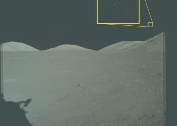 A photo from the Apollo 17 moon landing that highlights three dots in the sky as seen from the moon's surface