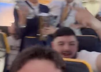 A Ryanair flight set to land in Ibiza descended into partying chaos as passengers started singing and dancing