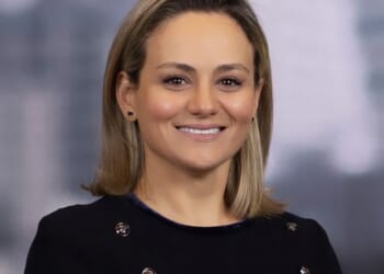 Lorna Hajdini, an executive director at JPMorgan Chase, was accused in a legal filing that named the complaint as 'John Doe'