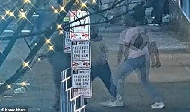 Two thugs were caught on video viciously beating an elderly man outside of 'America's scariest McDonald's'