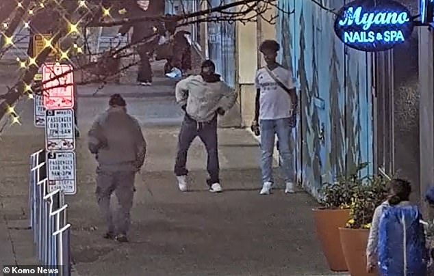 Two men were seen standing on the street outside the eatery around 10pm