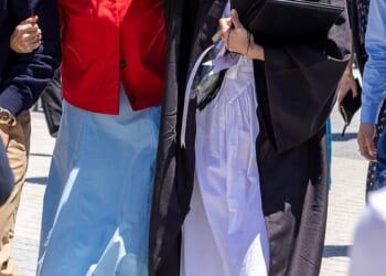 Apple Martin brought her divorced parents back together on Friday when she graduated from prestigious Vanderbilt University in Nashville on Friday