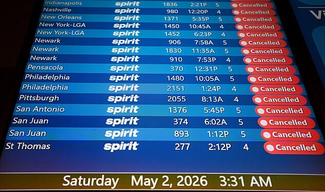 Spirit Airlines canceled all flights in the middle of the night on Saturday. Pictured above is a departure board at Orlando International Airport