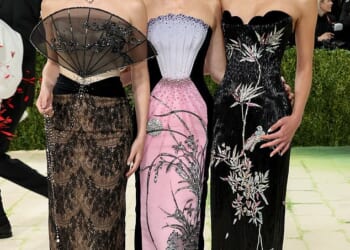 Rupert Murdoch and Wendi Deng's daughters Grace (left) and Chloe (right) were the spitting image of their glamorous mother (centre) as they arrived at the 2026 Met Gala on Monday