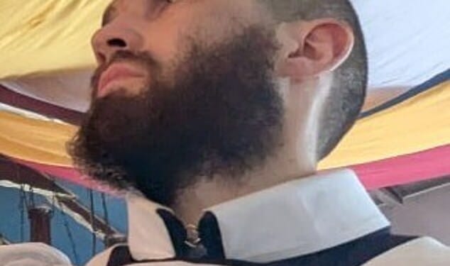 Young monk Justin Evans, 24, is described as being around 6ft tall, with short hair and a dark beard