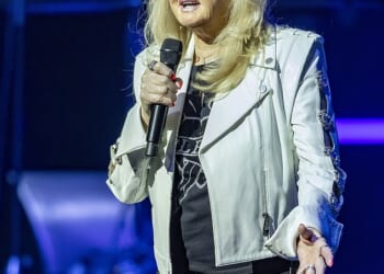 Bonnie Tyler, 74, is in an 'induced coma' after her health reportedly worsened in Portugal on Thursday following emergency bowel surgery (pictured in May 2025)