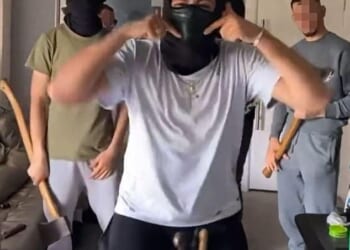 Sweeping across the country at a terrifying pace, Albanian gangs have rapidly taken over the UK's drug market - and all the crime that comes with it (Pictured: five Albanians armed with knives, machetes and axes dance in footage captioned: 'Ready to break into cannabis houses')