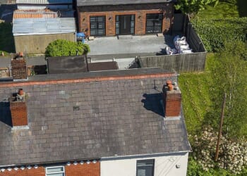 An aerial view of the existing terraced house and the brand new annexe in the garden