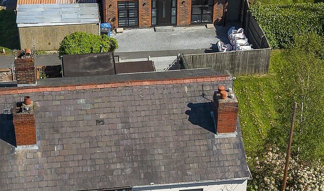 An aerial view of the existing terraced house and the brand new annexe in the garden