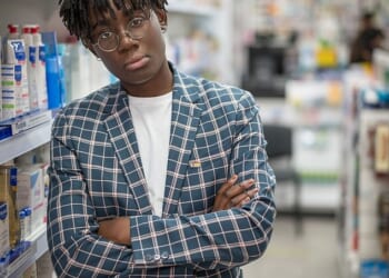 Dr Ronx Ikharia (pictured), who presents Operation Ouch!, was seen using a loud hailer outside a meeting of doctors and academics at the Royal College of General Practitioners in London