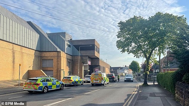 Police were called after the vehicle, a red Vauxhall Astra, hit multiple people in Market Place (pictured), Arnold, in Nottinghamshire, at around 1:12am