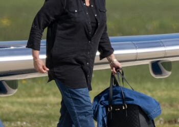 Miranda Hart was all smiles as she arrived in Scotland with her rarely-seen husband Richard Fairs on Sunday ahead of filming Celebrity Traitors