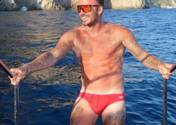 David Beckham showed off his chiselled physique in tiny Speedos as wife Victoria penned a gushing birthday tribute to mark the star's 51st