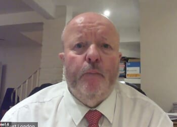 Peter Kirkham, pictured appearing as a TV pundit on Channel 4, is charged with sexually assaulting two young men