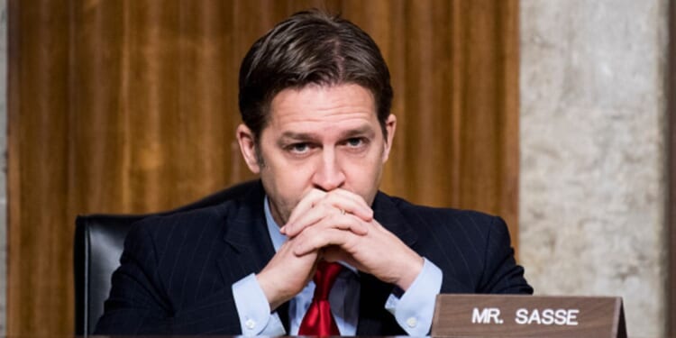 Former Senator Bill Sasse sits in the Senate Armed Services Committee room on January 12, 2017.