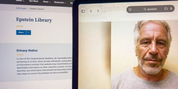 A close up image of a tablet screen displaying a portrait of Jeffrey Epstein beside the official U.S. Department of Justice website page on Feb. 11, 2026.