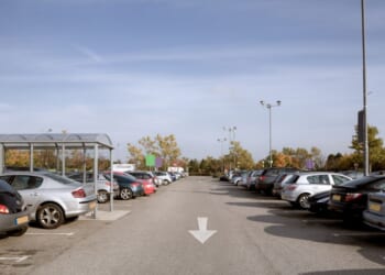 Cars in a shopping center.