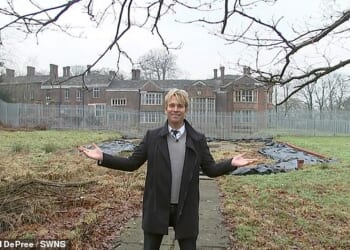 Hopwood DePree, 56, pictured outside the derelict hall in 2017 as he began efforts to restore it