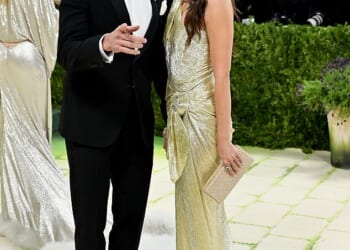 Hugh Jackman has been slammed for attending this year's Met Gala with his new girlfriend Sutton Foster